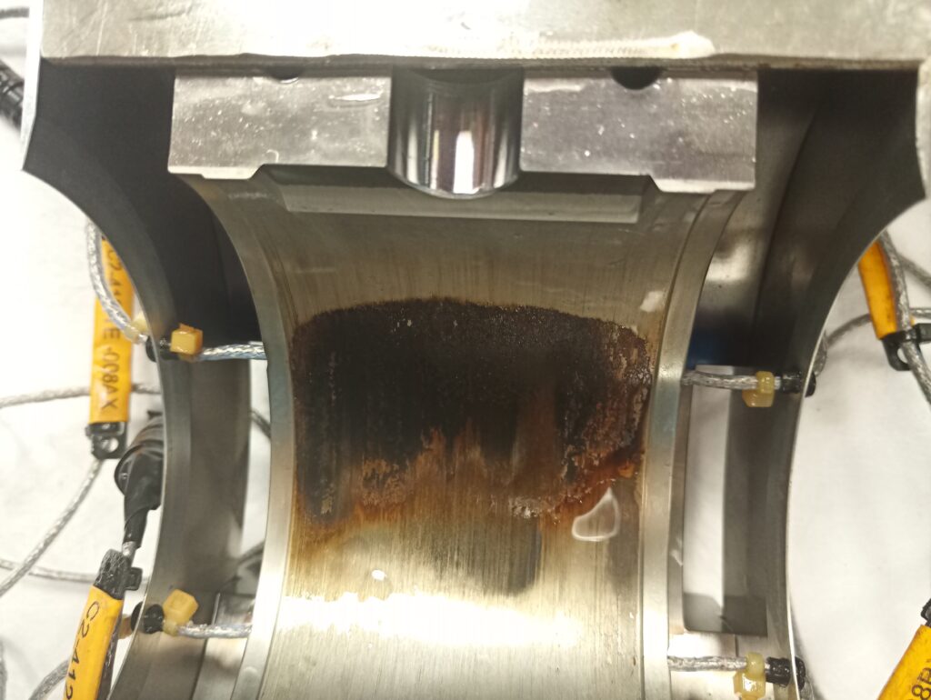 Visible varnish deposits on industrial system components, illustrating deposits that may explain abnormal system behaviour.